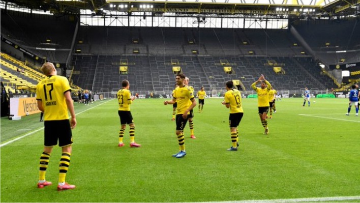 Borussia Dortmund Players celebrating. Photo credit: Goal.com